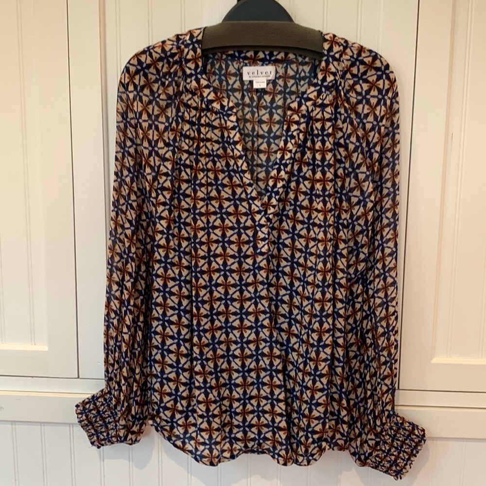 Velvet by Graham & Spencer. Semi-sheer split neck patterned blouse.